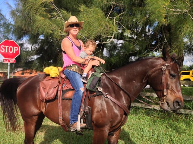 Sheryl with animals at her barn